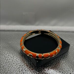 Hinged bracelet gold tone orange enamel light weight casual dressy festival